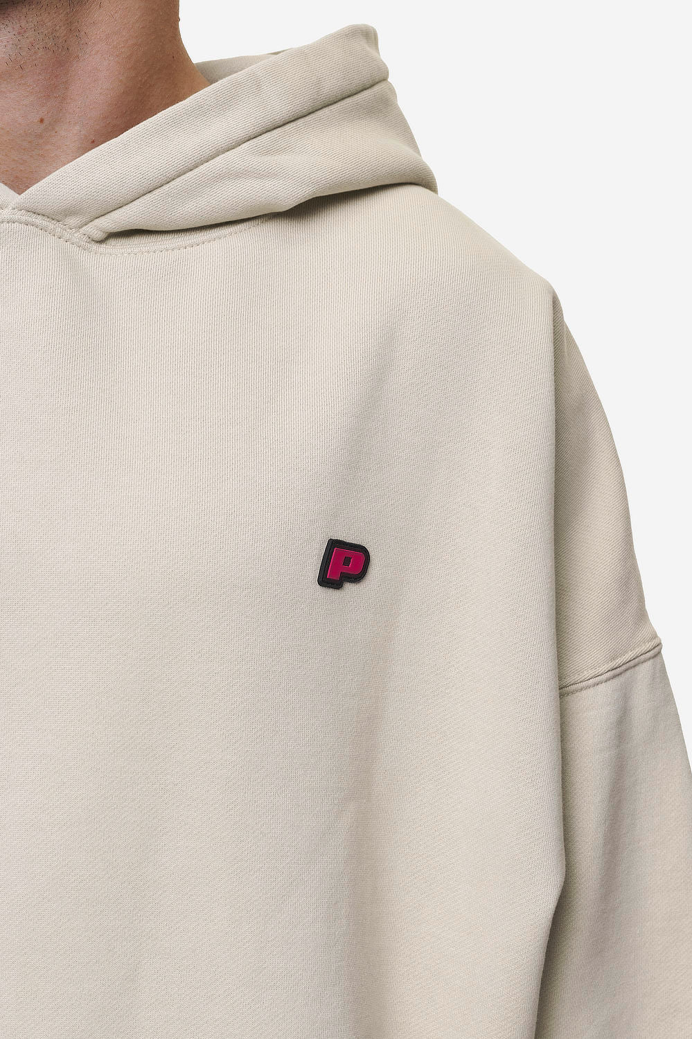 Pegador Leono Boxy Hoodie Washed Light Beige Virtual Pink Gum Detailshot aus der Most Alive Kollektion für Herren