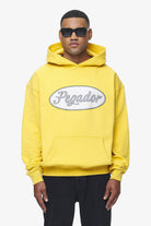 Pegador West Oversized Hoodie Vintage Washed Solar Yellow Seitenansicht aus der Trust The Process Kollektion für Herren