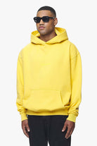 Pegador Colne Logo Oversized Hoodie Vintage Washed Solar Yellow Gum Gegenansicht aus der Trust The Process Kollektion für Herren