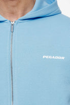 Pegador Colne Logo Oversized Sweat Jacket Vintage Washed Riviera Blue Detailshot aus der Finer Things Kollektion für Herren