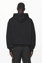 Pegador Manor Oversized Hoodie Black Signal Red Seitenansicht aus der Do not Disturb Kollektion für Herren