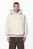 Pegador Eads Oversized Hoodie Washed Dust Cream Seitenansicht aus der Do not Disturb Kollektion für Herren