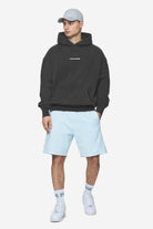 Pegador Colne Logo Oversized Hoodie Vintage Black Baby Blue Ganzkörper Bild aus der Next Wave Kollektion für Herren