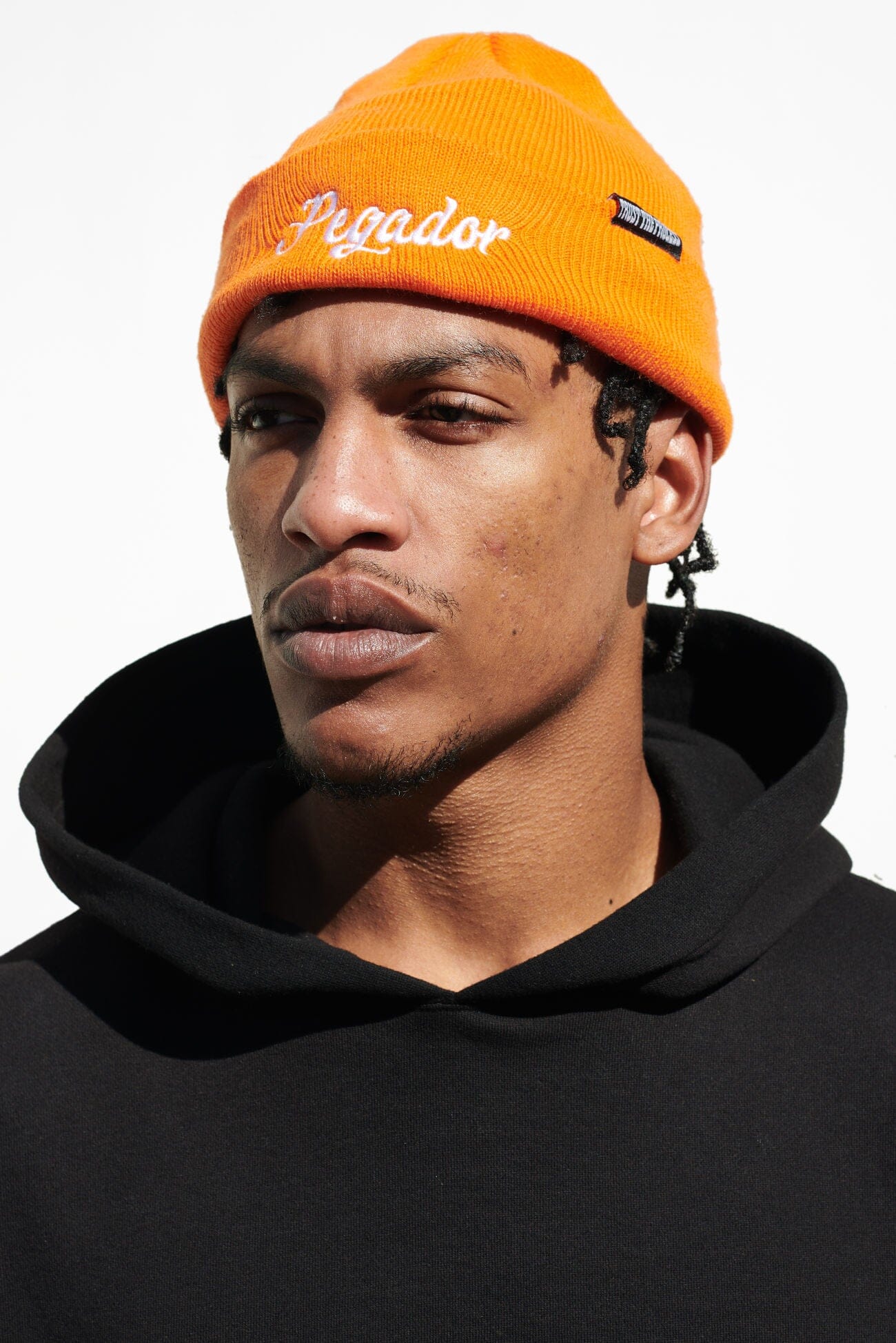 Pegador Birch Fisherman Beanie Sunrise Orange White Hauptansicht aus der Trust The Process Kollektion für Herren