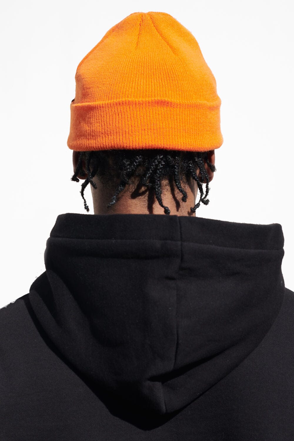 Pegador Birch Fisherman Beanie Sunrise Orange White Seitenansicht aus der Trust The Process Kollektion für Herren