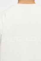 Pegador Colne Logo Oversized Tee Vintage Washed Angels Cream Gum Detailshot aus der Trust The Process Kollektion für Herren