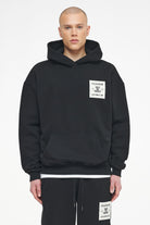 Pegador Salal Oversized Hoodie Vintage Washed Black Ink Seitenansicht aus der Trust The Process Kollektion für Herren