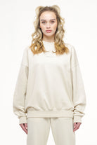 Pegador Bay Oversized Sweater Vintage Washed Angels Cream Gum Hauptansicht aus der Trust The Process Kollektion für DaHerren