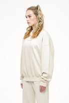 Pegador Bay Oversized Sweater Vintage Washed Angels Cream Gum Seitenansicht aus der Trust The Process Kollektion für DaHerren